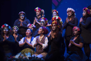 A picture of a group of people performing an opera