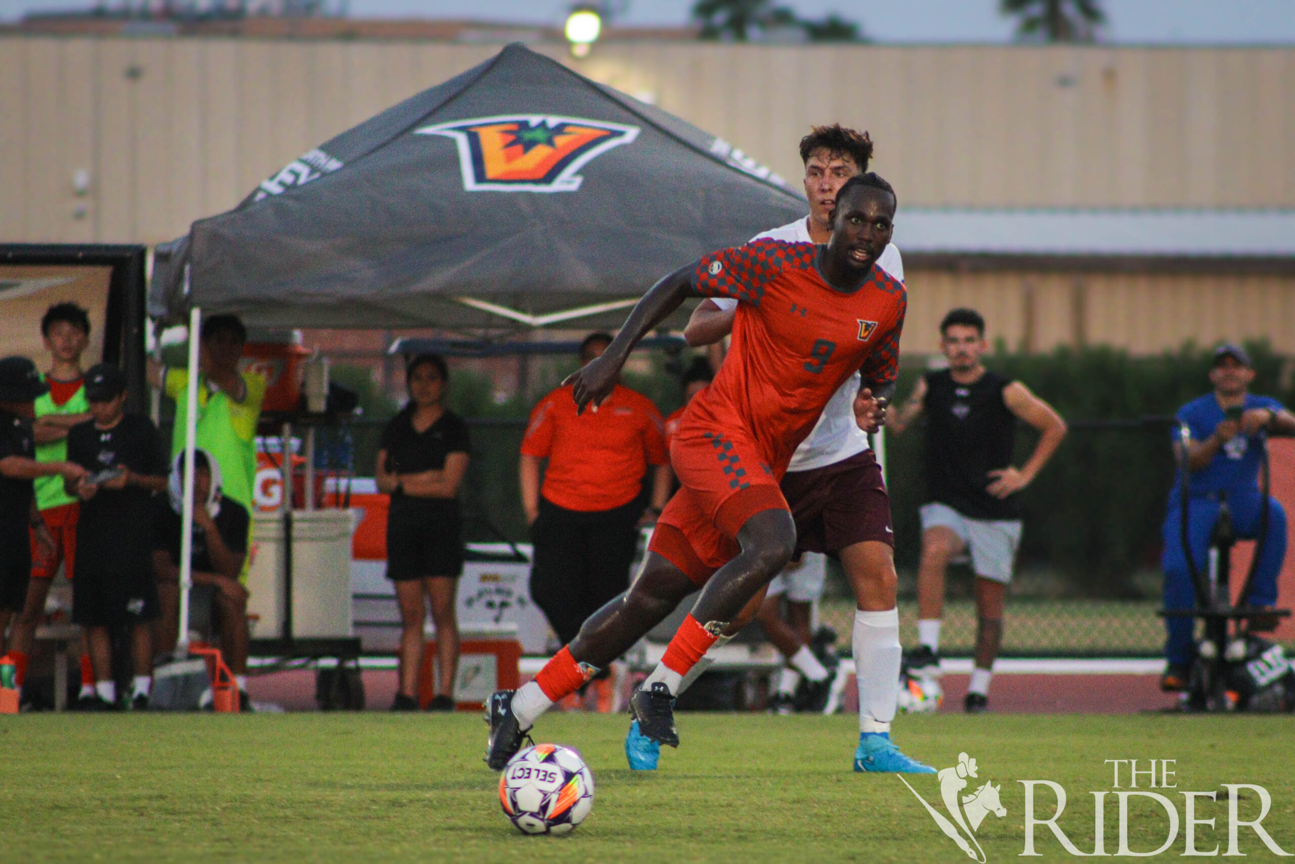 Junior forward Kgodiso Sukati searches for a teammate to pass to during tonight’s exhibition match against Texas A&M International University at the UTRGV Soccer and Track & Field Complex on the Edinburg campus. The Vaqueros won 3-2 against the Dust Devils. Abigail Ollave/THE RIDER