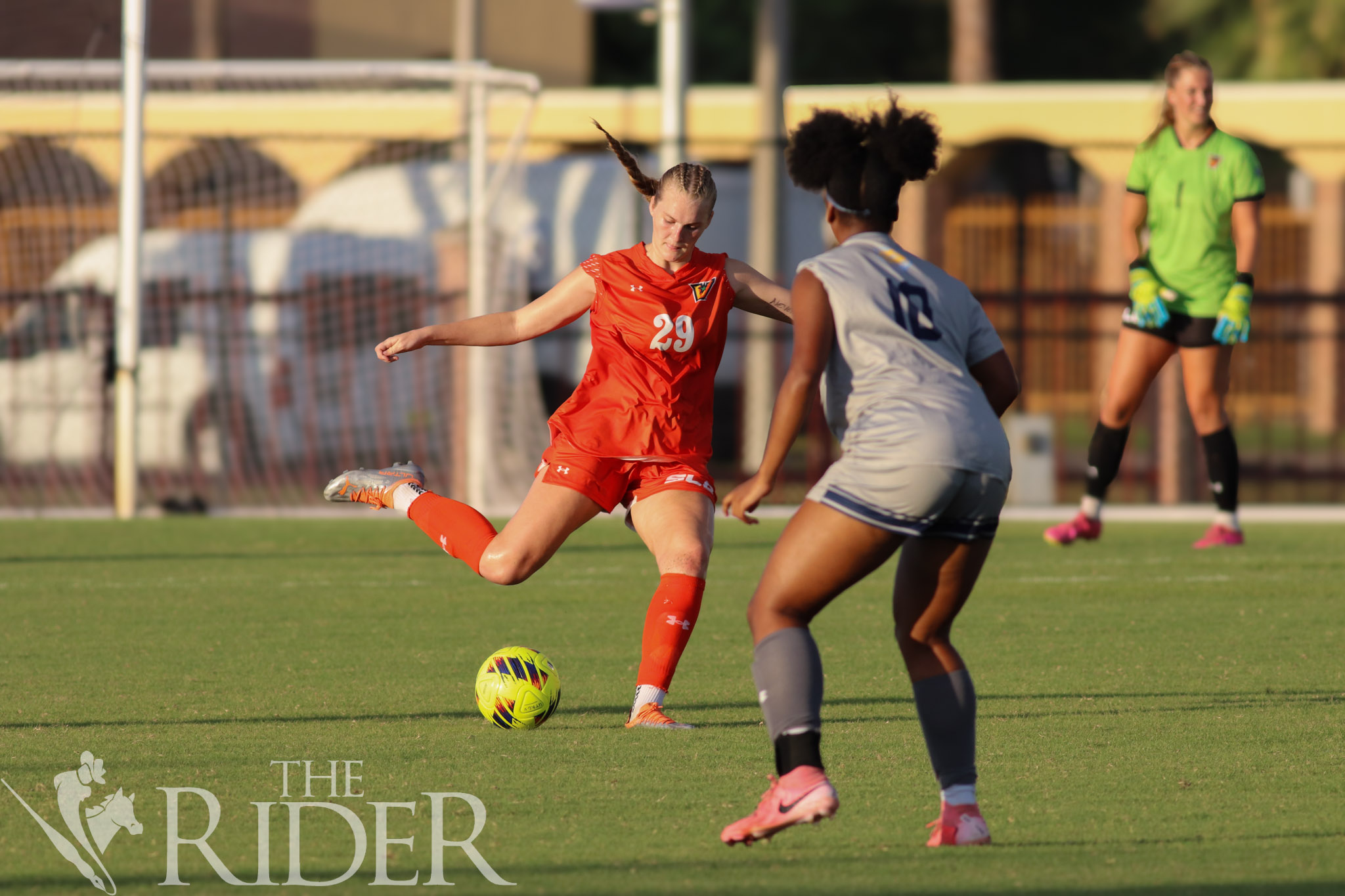 Vaquero junior defender Libbie Mayfield winds up to kick the ball during tonight's game against Southern University and A&M College at the Soccer and Track & Field Complex on the Edinburg campus. Also shown is Jaguar freshman forward Azariya Smith. Abigail Ollave/THE RIDER
