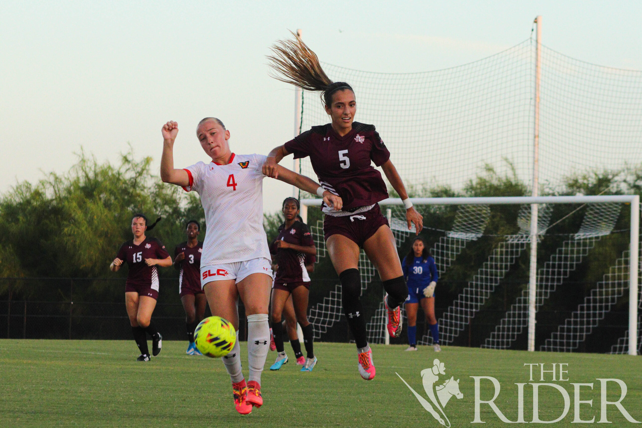 Vaqueros senior midfielder Sam Maudsley and Texas Southern University sophomore forward Isabella Dillow fight for the cross during tonight’s season opener at the UTRGV Soccer and Track & Field Complex on the Edinburg campus. Abigail Ollave/THE RIDER