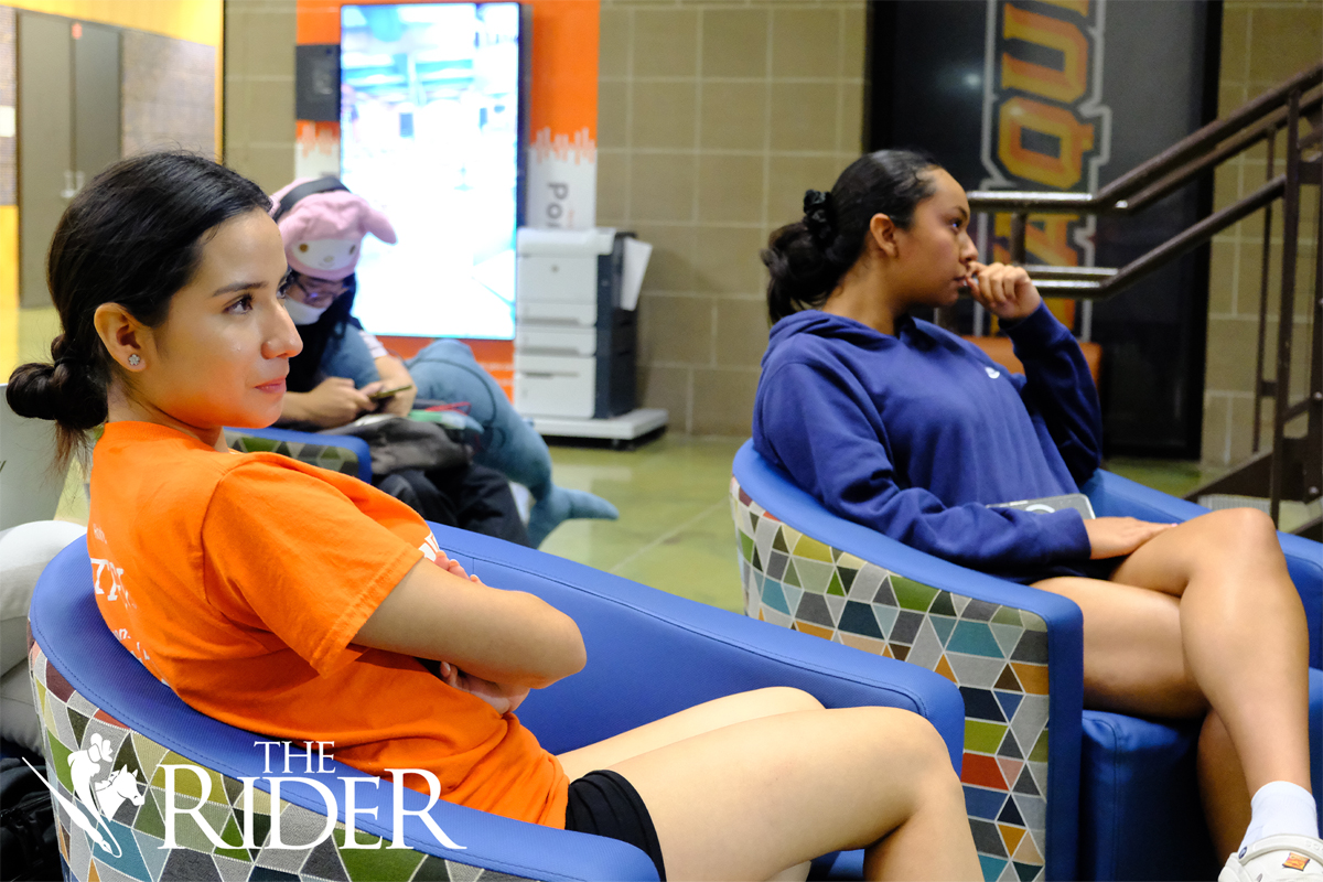 Biology freshman Vanesa Calvillo (left) and psychology freshman Isabella Garcia attend the Presidential Debate Watch Party Tuesday evening in the Student Union on the Edinburg campus. Angel Ballesteros/THE RIDER