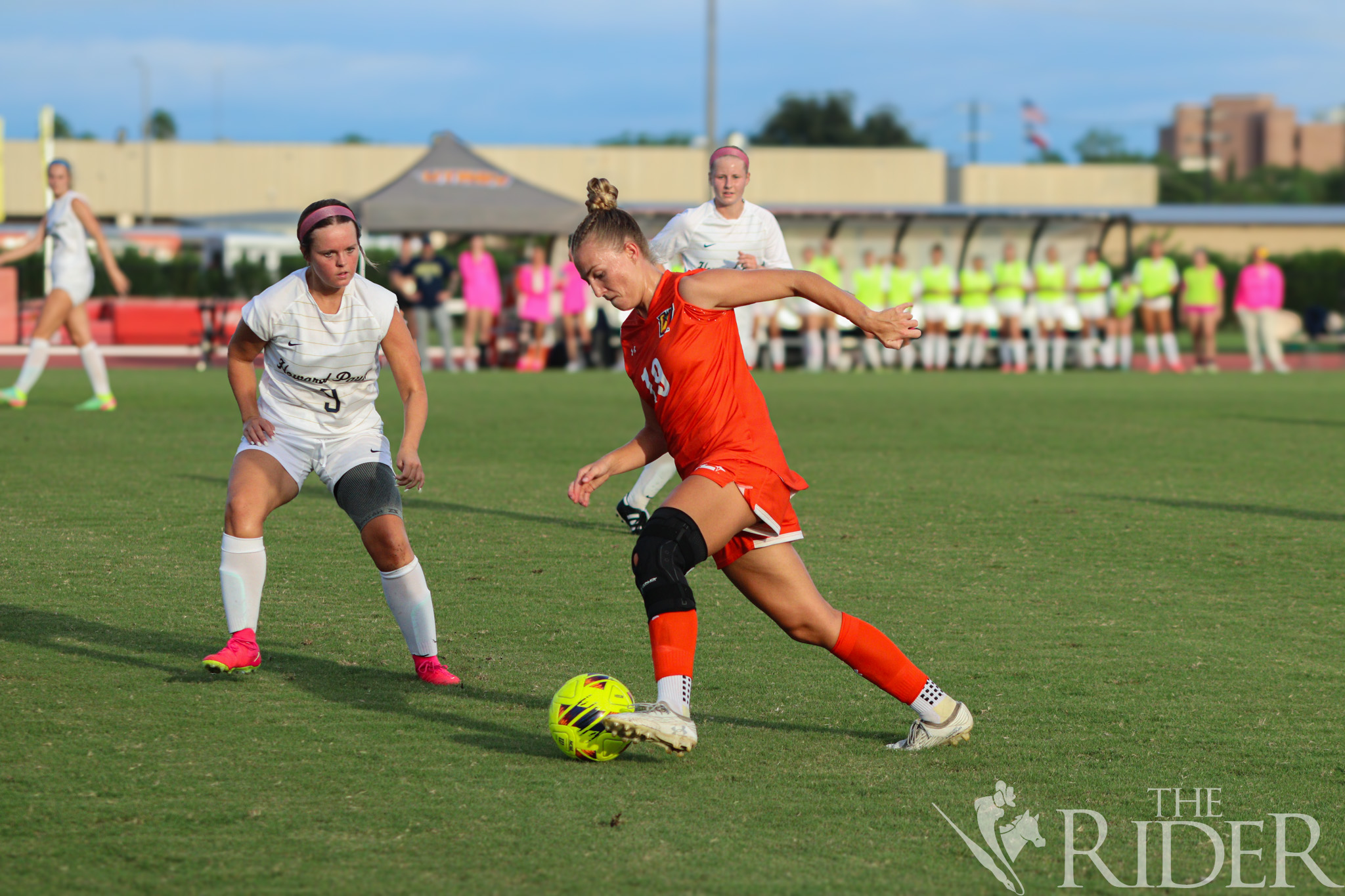 Vaqueros redshirt junior winger Savannah Frisby possesses the ball against Yellow Jacket senior midfielder Addie Carroll during tonight’s match at the UTRGV Soccer and Track & Field Complex on the Edinburg campus. Abigail Ollave/THE RIDER