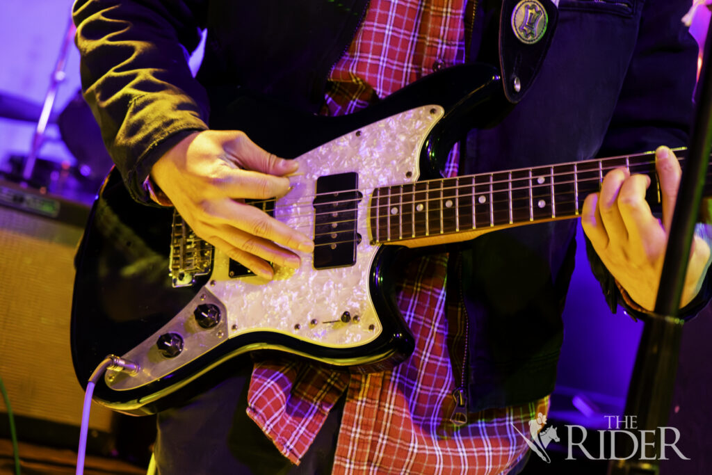 Nick Tamayo, lead singer for Cannon the Dealers, shreds on guitar and lights up the stage, leaving fans in frenzy Saturday in the Jukebox Bar, located at 1225 E. Adams St. in Brownsville. Eduardo Escamilla/THE RIDER