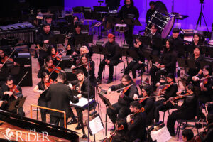 The UTRGV Symphony Orchestra performs music professor and composer Justin Writer’s piano concerto “Wild, Wild, West!” Thursday in the Performing Arts Complex on the Edinburg campus. Amara Cazares/THE RIDER
