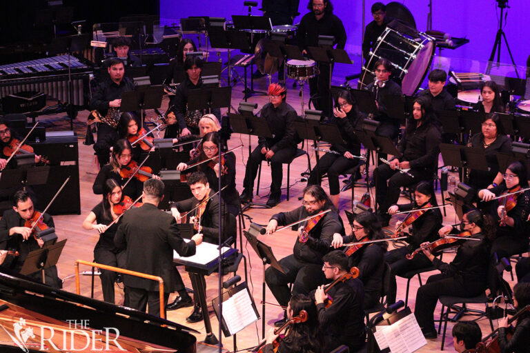 The UTRGV Symphony Orchestra performs music professor and composer Justin Writer’s piano concerto “Wild, Wild, West!” Thursday in the Performing Arts Complex on the Edinburg campus. Amara Cazares/THE RIDER