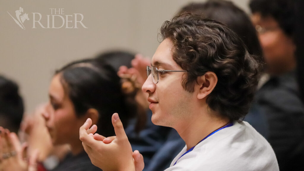 Music composition freshman Alejandro Garcia applauds a performance in La Frontera International Piano Conference’s “French Masters: The legacy of Fauré & Ravel” Friday in the Music, Science and Learning Center on the Brownsville campus. Mykel Del Angel/THE RIDER