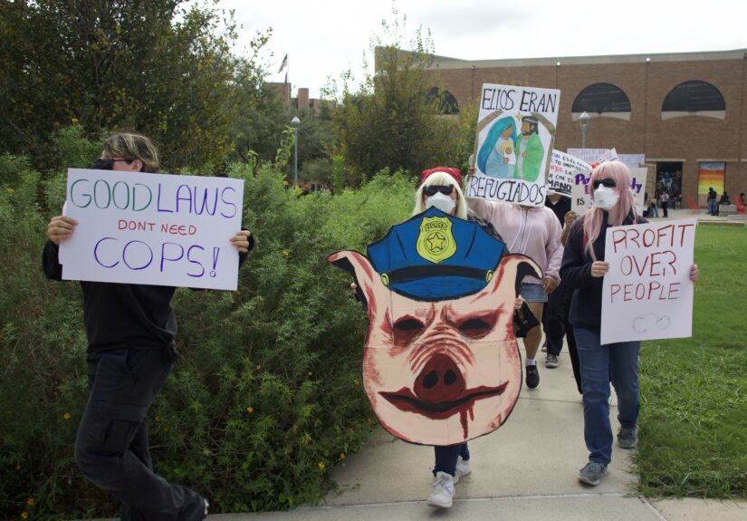 Protesters march around the UTRGV Student Union Quad in observance of National Protest Against Police Brutality Day
